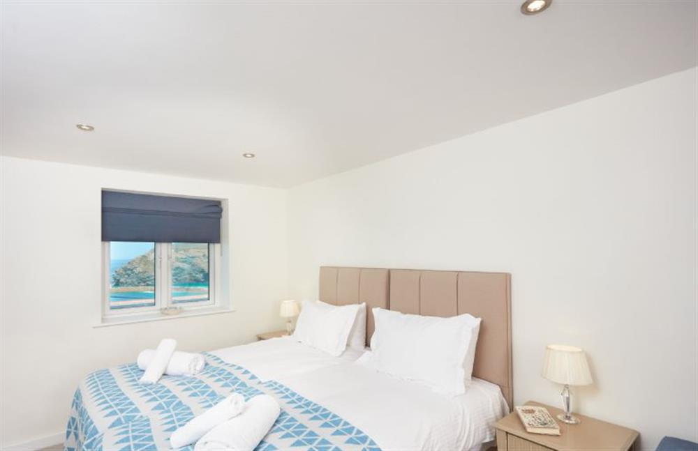 Bedroom two with twin single beds (available as super-king on request), en-suite and sea views at Westaway, Portreath