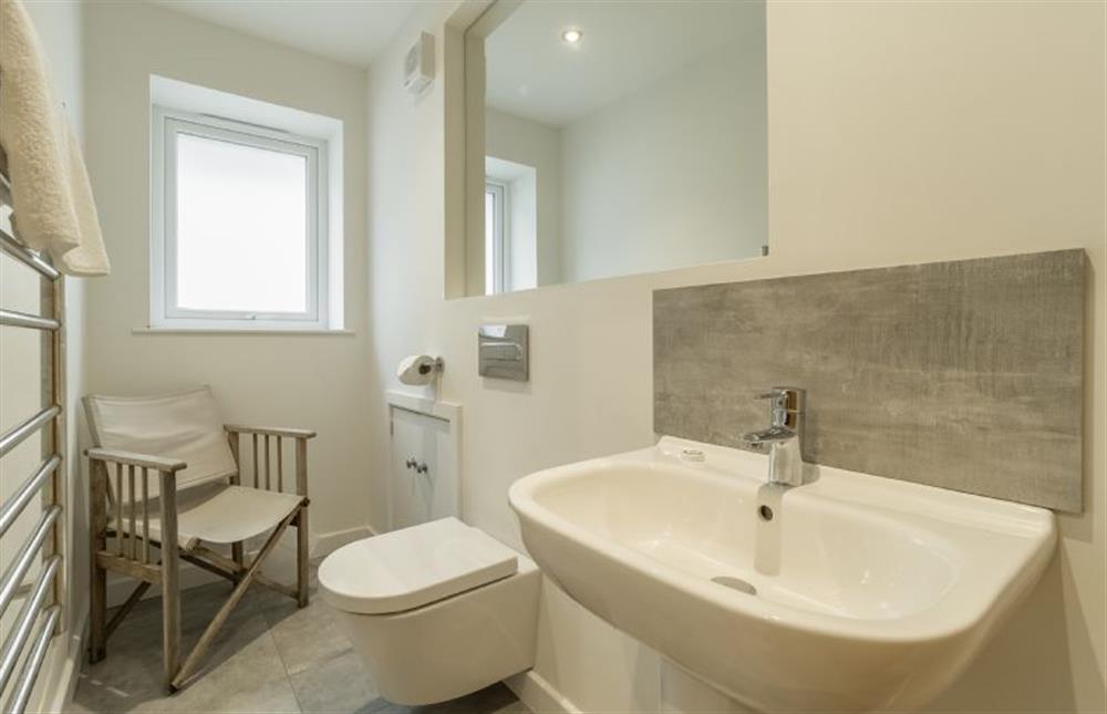 Cloakroom near the living area with wash basin and WC at Westaway, Portreath