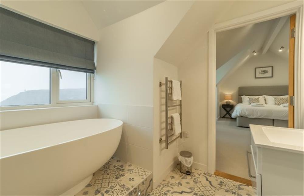 Master bedroom en-suite with feature bath, seperate shower, wash basin and WC (photo 2) at Westaway, Portreath
