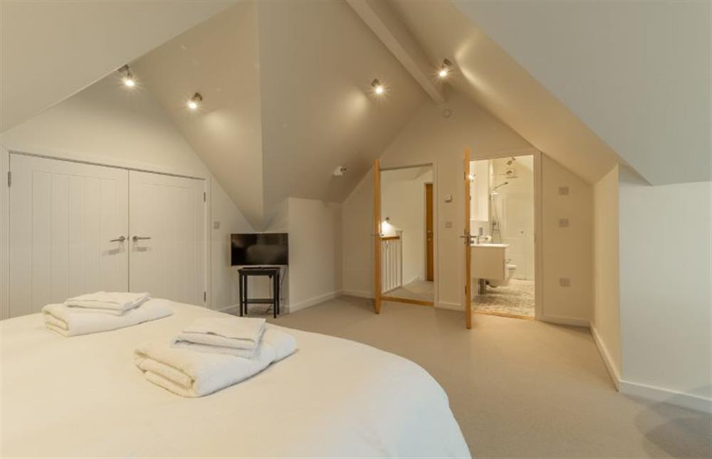 Master bedroom with en-suite, television and plenty of storage facilities at Westaway, Portreath