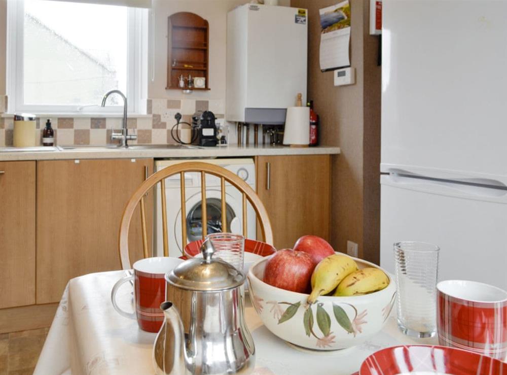 Well-equipped kitchen with dining area at Westcliff in Whitehills, near Banff, Aberdeenshire
