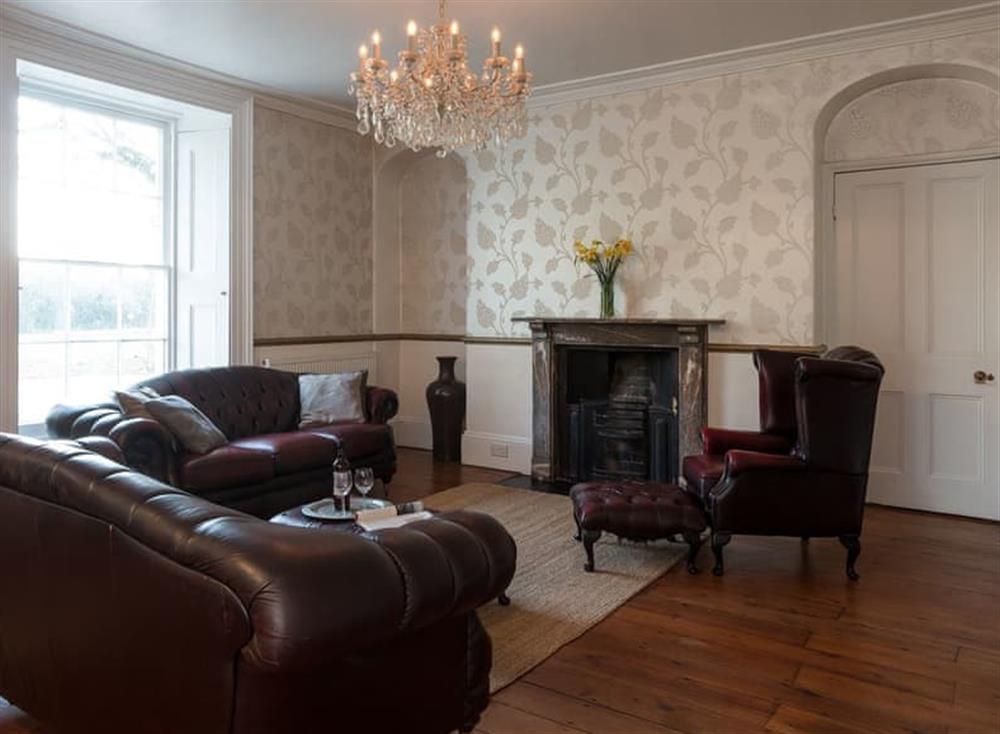 Living room with open fire (photo 2) at Westcott House in Rockbeare, near Exeter, Devon