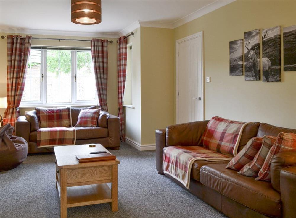 Comfortable seating within living area at Western Fells Cottage in Rowrah, near Frizington, Cumbria