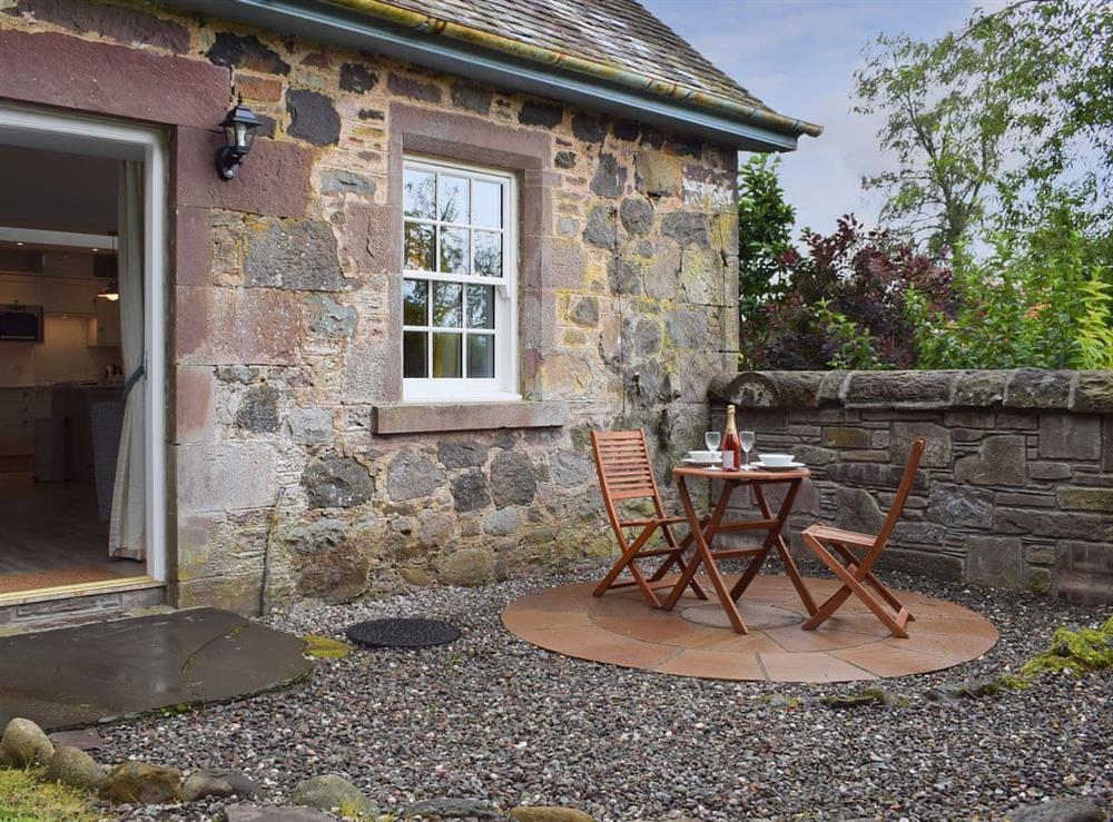 Secluded sitting out area on the gravelled patio at The Old Stables at Westerton, 