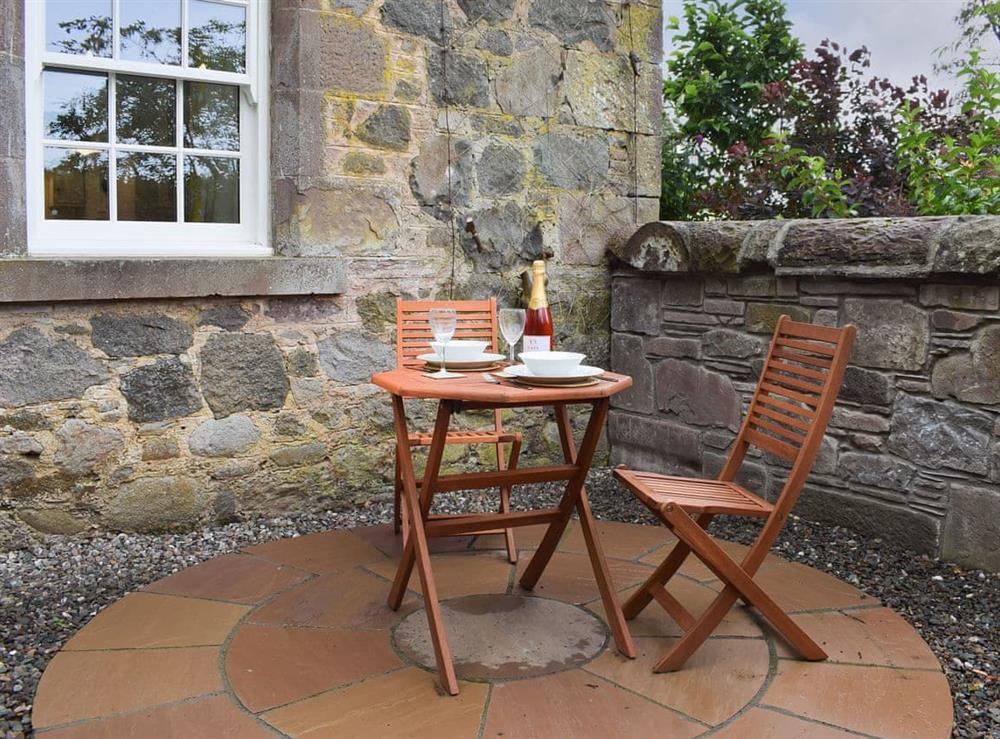 Sheltered spot for alfresco dining at The Old Stables at Westerton, 