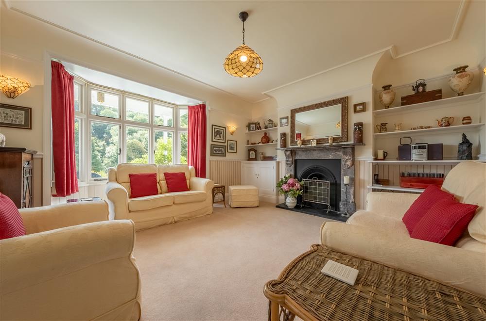 Ground floor: Sitting room with coal effect fire and Smart television at Westfield, Plymouth