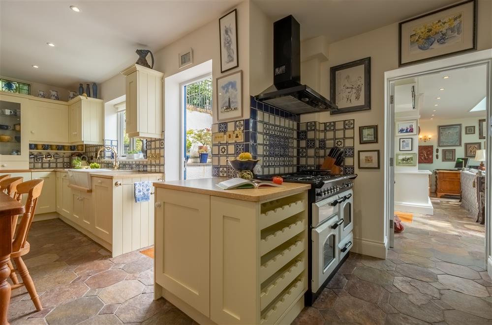 Ground floor: Well-equipped kitchen leading to the classic dining room at Westfield, Plymouth