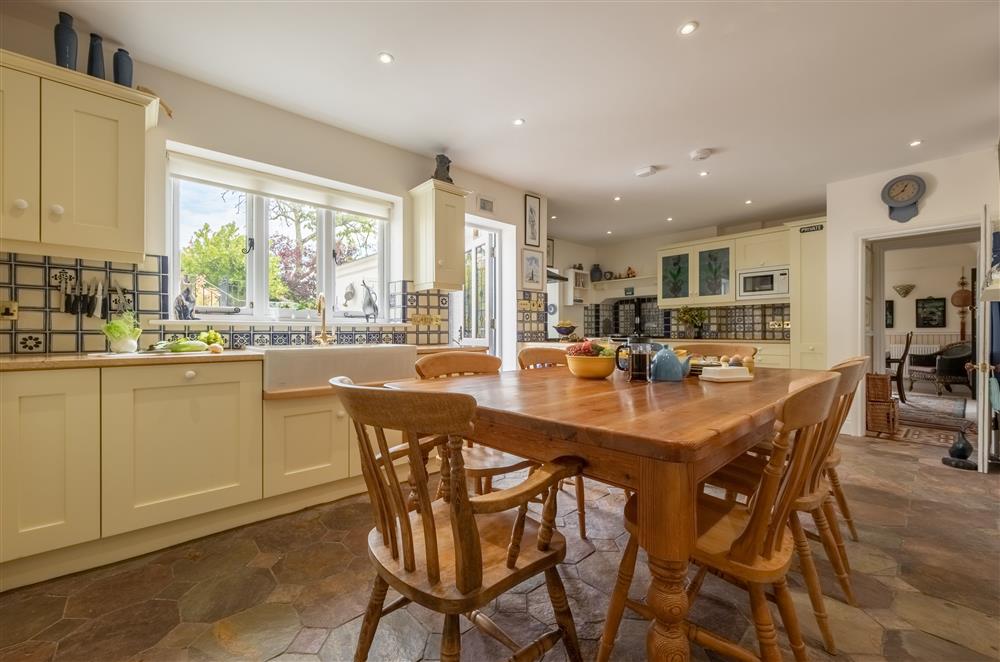 Ground floor: Well-equipped kitchen with table and seating for eight guests at Westfield, Plymouth
