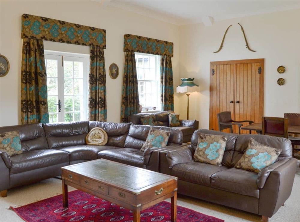 Spacious, comfortable living/ dining room at Westgate Cottage in St Lawrence, near Ventnor, Isle of Wight, Isle Of Wight