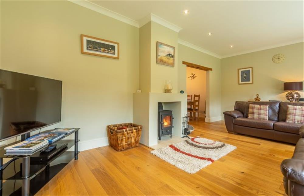 Ground floor: Sitting room with wood burning stove