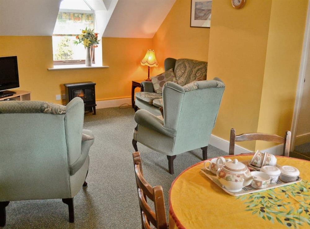 Open plan living/dining room/kitchen (photo 2) at Westonbirt Cottage in Westonbirt, near Tetbury, Gloucestershire