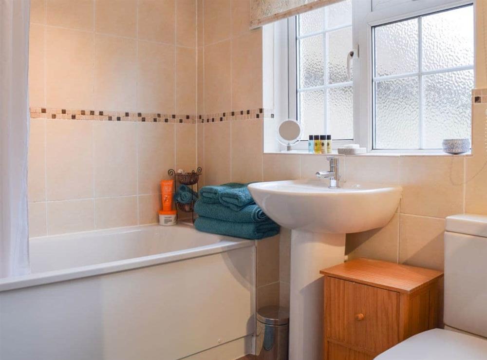 Lovely tiled bathroom with shower over bath at Westover Cottage in Nr. Abingdon, Oxon. , Oxfordshire