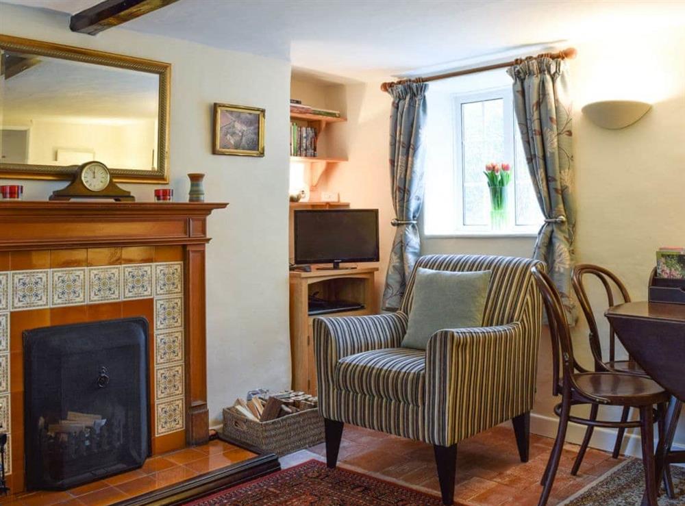Lovely traditional living/dining room with open fireplace at Westover Cottage in Nr. Abingdon, Oxon. , Oxfordshire
