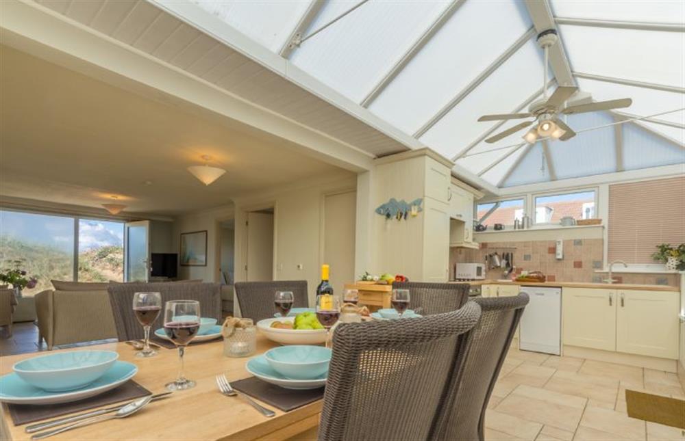 Ground floor: Looking to the kitchen from the dining area at Westward Ho, Heacham near Kings Lynn