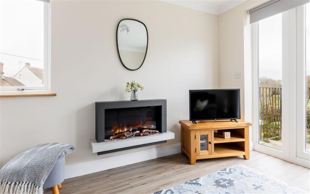 Relax in the living area at Westwinds Annexe in Landford