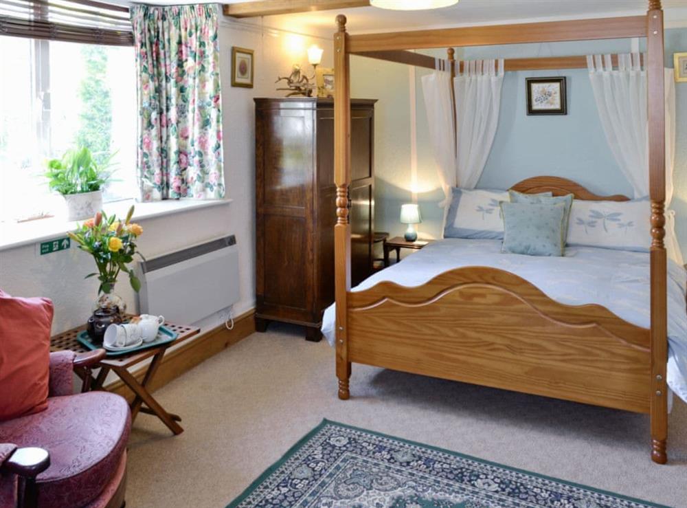 Four Poster bedroom at Wetherlam in Ulverston, Cumbria
