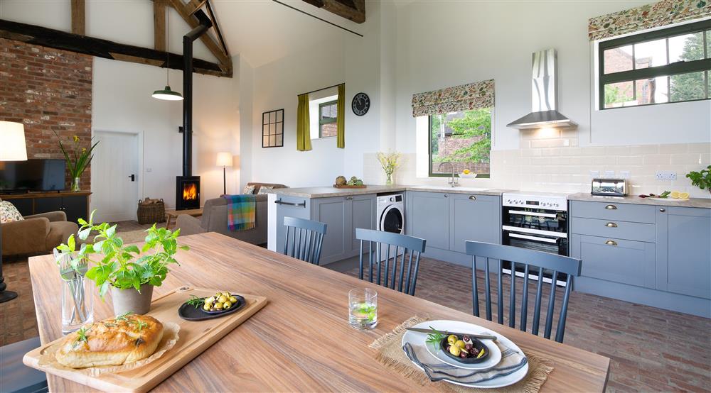 The open plan kitchen, dining and sitting room (photo 2) at Wharf Barn in Shrewsbury, Shropshire