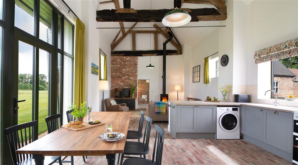 The open-plan kitchen dining and sitting room at Wharf Barn in Shrewsbury, Shropshire