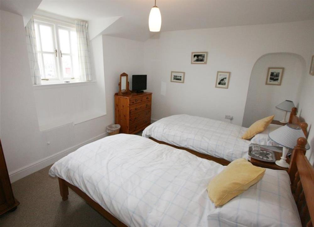Front twin bedroom facing the canal at Wharfinger in Bude