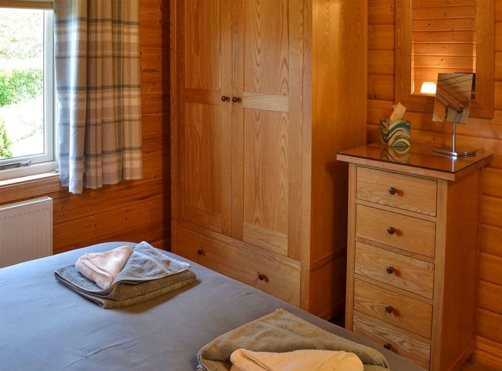 Bedroom with ample storage at Wheal Metal Lodge in Poldown, near Helston, Cornwall