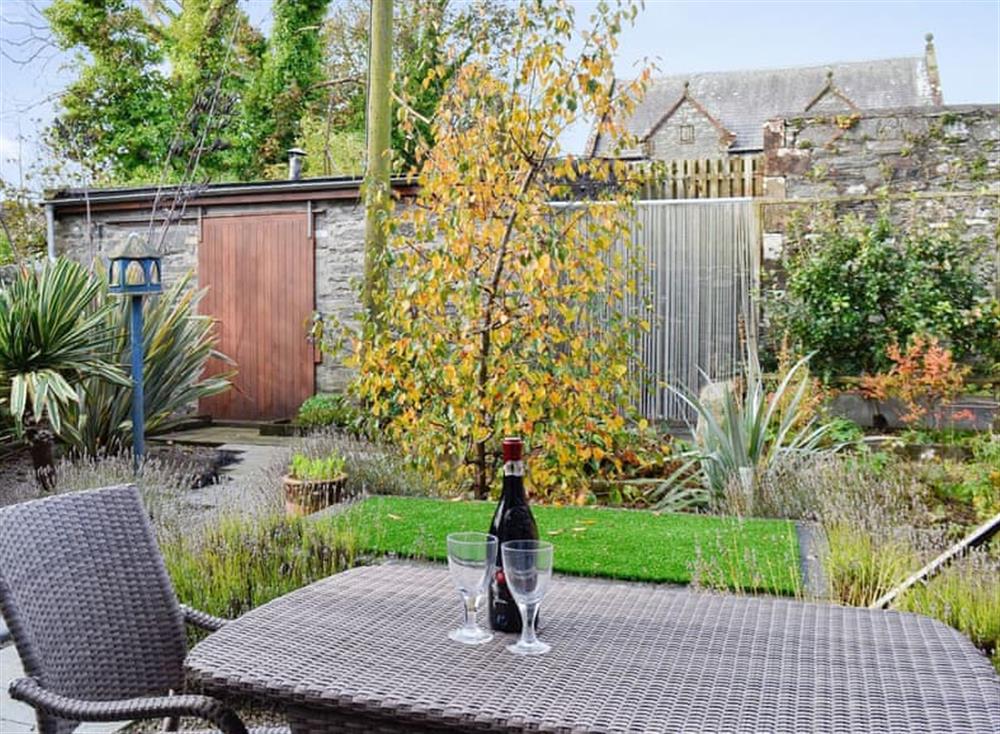 Rear patio and bike store at Wheel House in Garlieston, near Newton Stewart, Wigtownshire