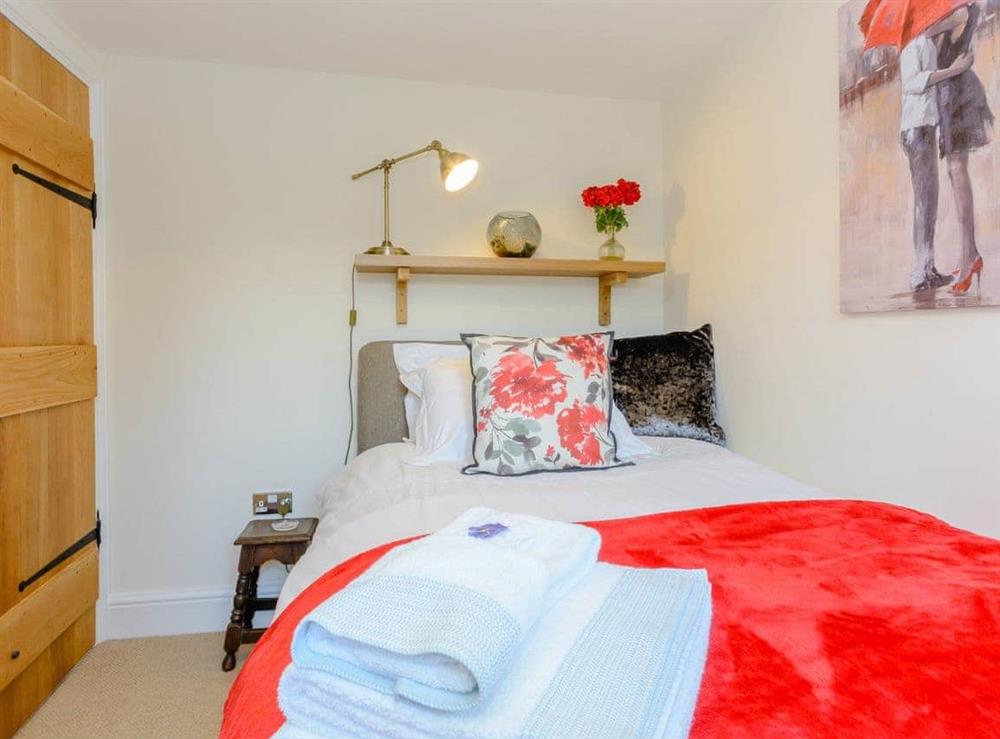 Inviting bedroom with ¾ double bed at Whibberley Cottage in Ashford-in-the-Water, near Bakewell, Derbyshire