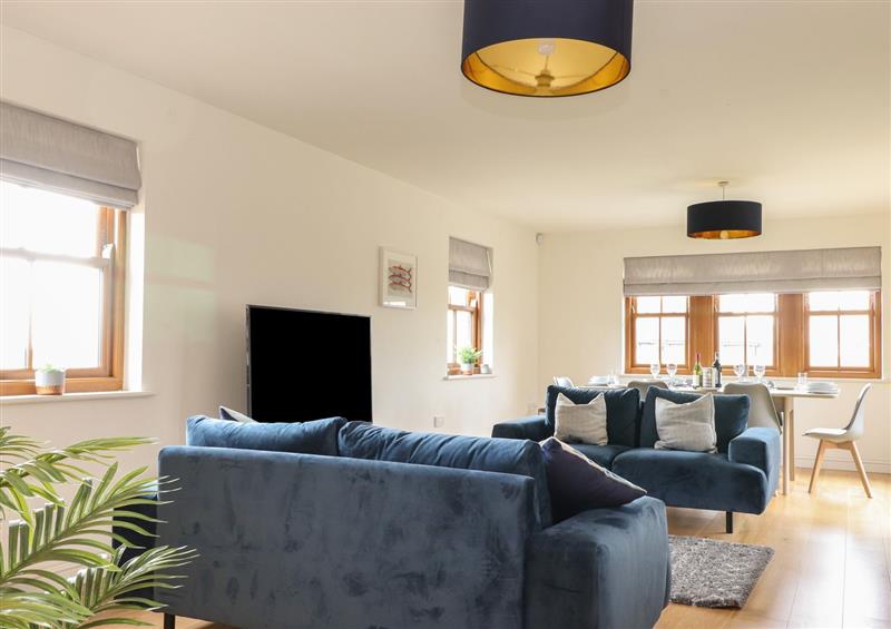 Relax in the living area at Whin Hill Cottage, Craster