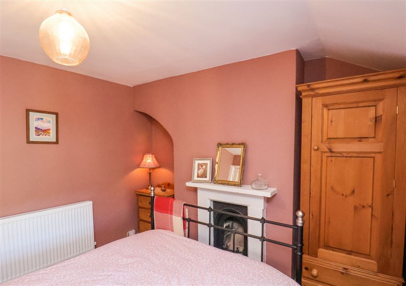 A bedroom in Whinstone Cottage at Whinstone Cottage, Esk Valley near Grosmont