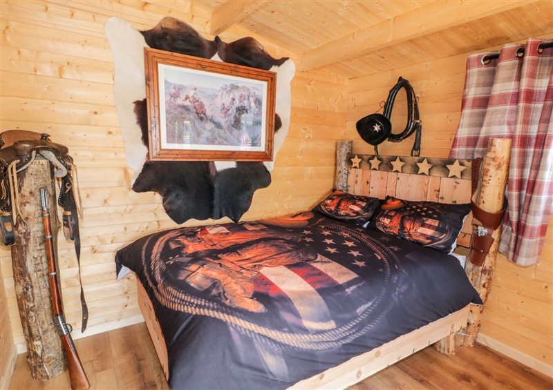 One of the bedrooms at Whiskey Creek Cabin, Castlerock