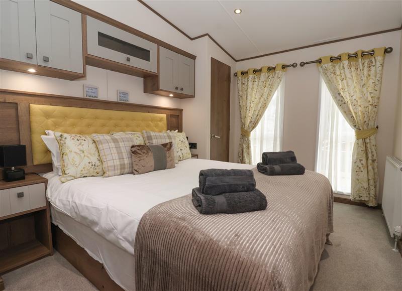 This is a bedroom at Whispering Willows, Cayton Bay