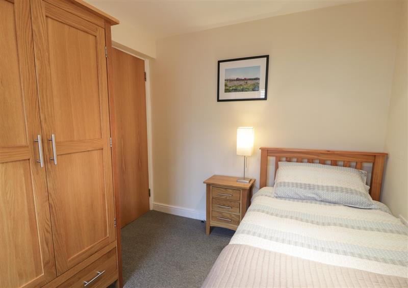 One of the bedrooms at Whistle Stop Apartment, Porthmadog
