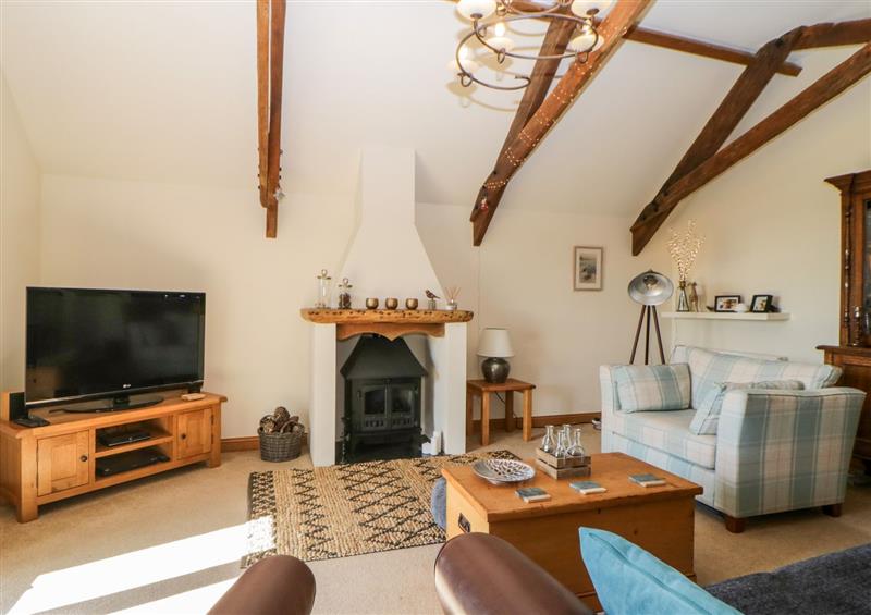 Relax in the living area at Whistley Barn, Blackawton