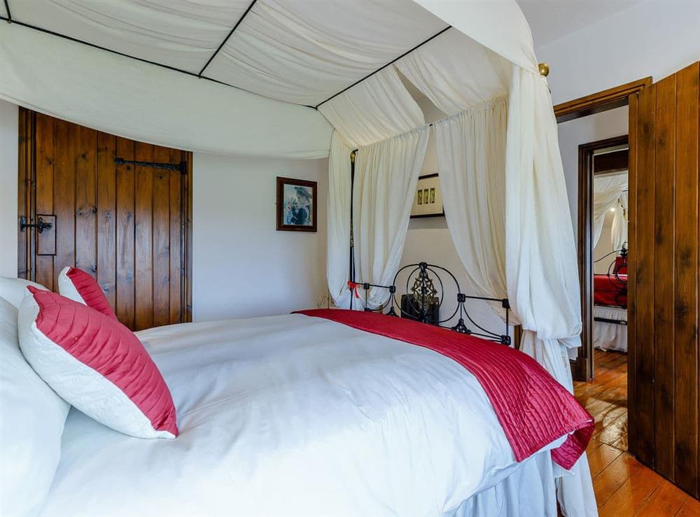 Four Poster bedroom (photo 3) at Lakeside Escape, 