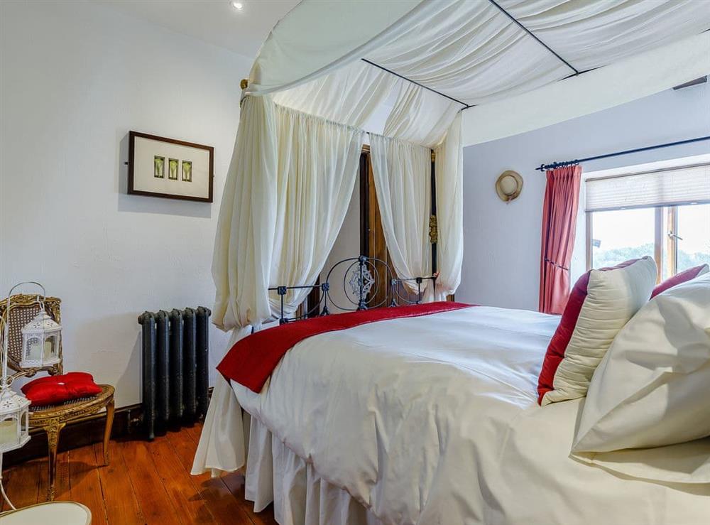 Four Poster bedroom at Lakeside Escape, 