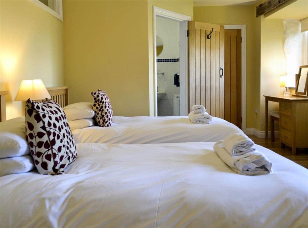 Twin bedroom at White Dove Barn in Wembury, Devon