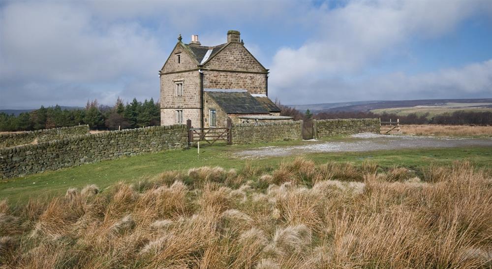 The windswept exterior of White Edge Lodge, nr Sheffield, Derbyshire