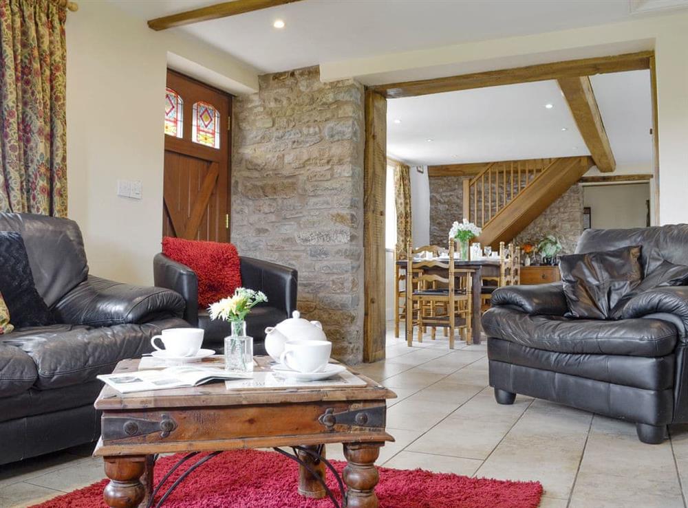 Comfy living room with open-aspect to kitchen/diner at White Hill Farm Cottage in Wonastow, near Monmouth, Monmouthshire, Gwent