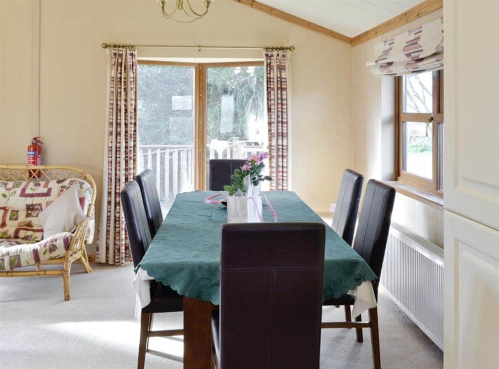 Open plan living/dining room/kitchen (photo 2) at Otters Holt, 