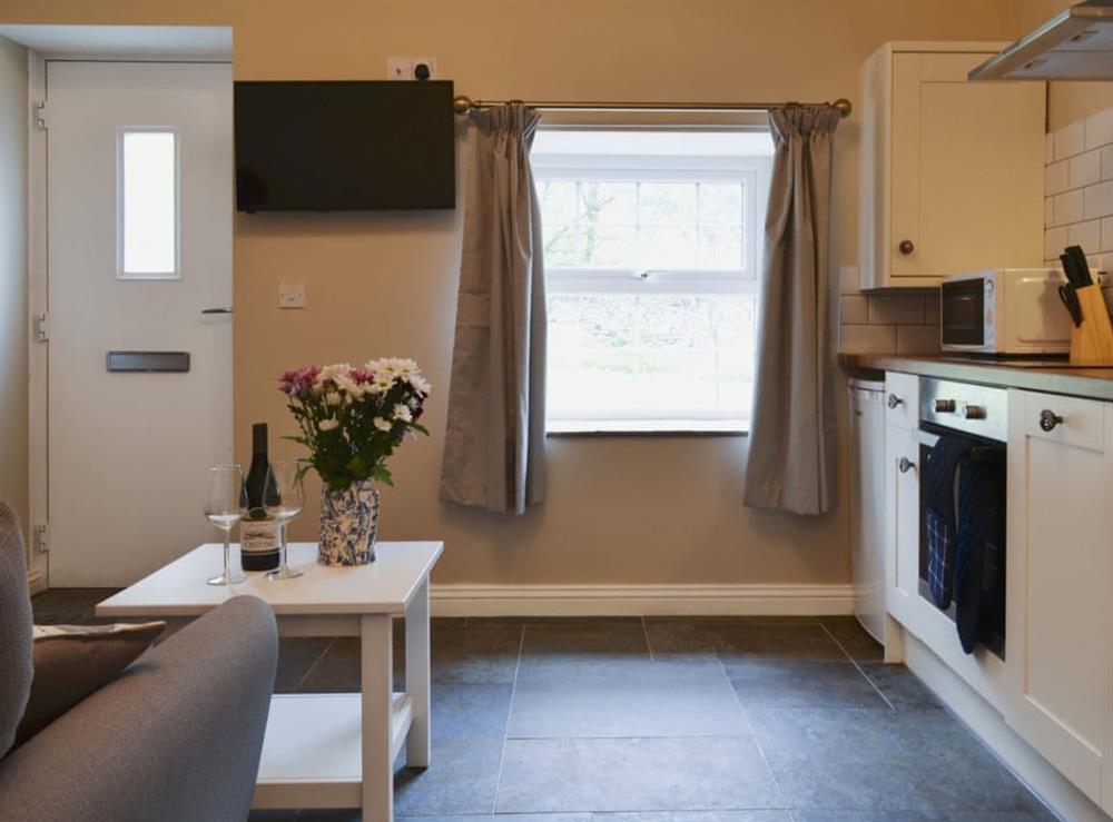 Compact and cosy open plan living space at The Hen House, 