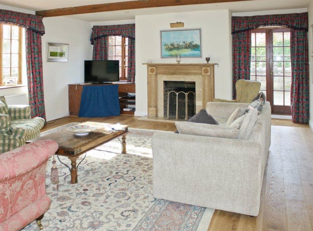Living room at White House Farm in Fring, near Kings Lynn, Norfolk