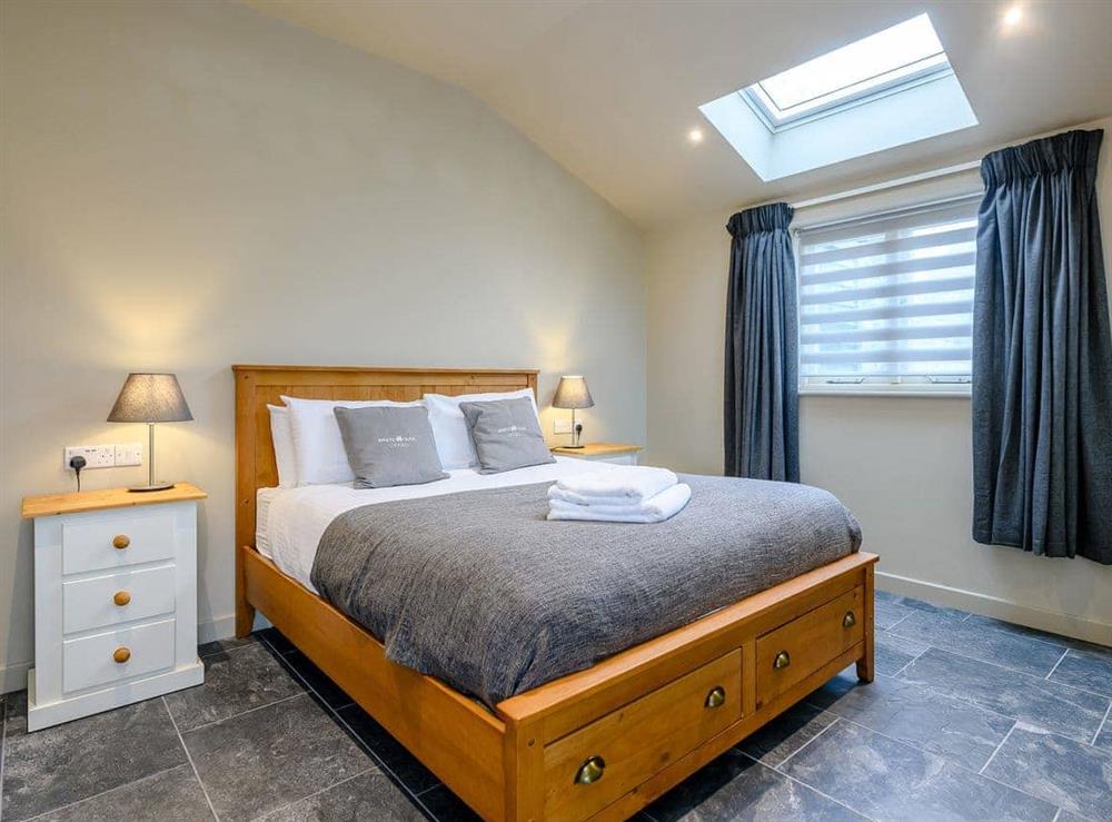 Welcoming bedroom with kingsize bed at Heveningham Farmhouse, 