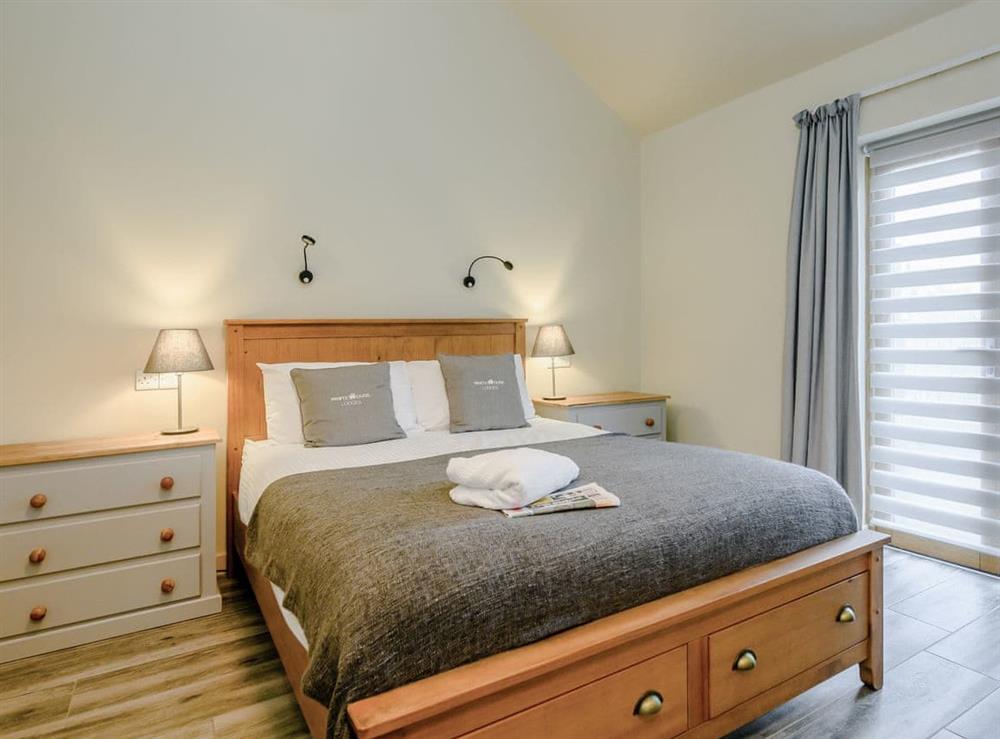 Relaxing bedroom with double bed at Holton Barn, 