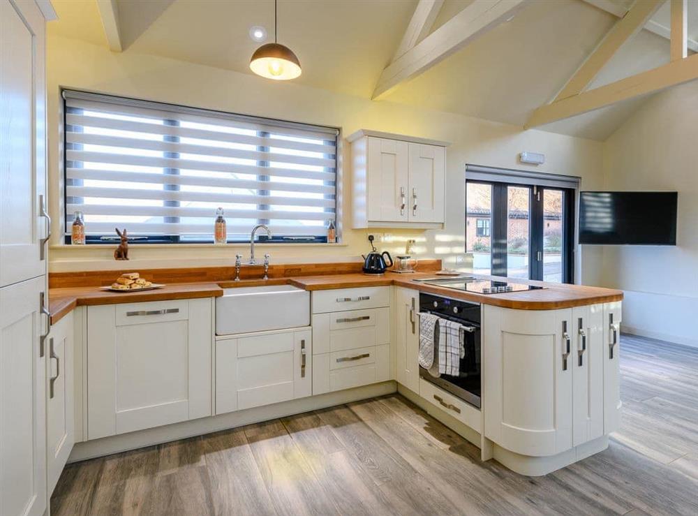 Well-equipped fitted kitchen at Laxfield Barn, 