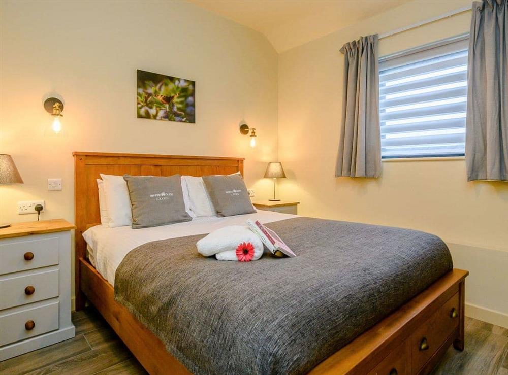 Relaxed bedroom with kingsize bed at Walpole Barn, 