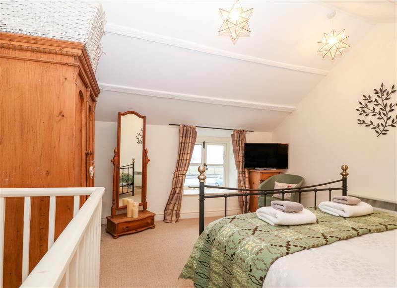 This is the bedroom (photo 2) at White Lilac Cottage, Brynsiencyn