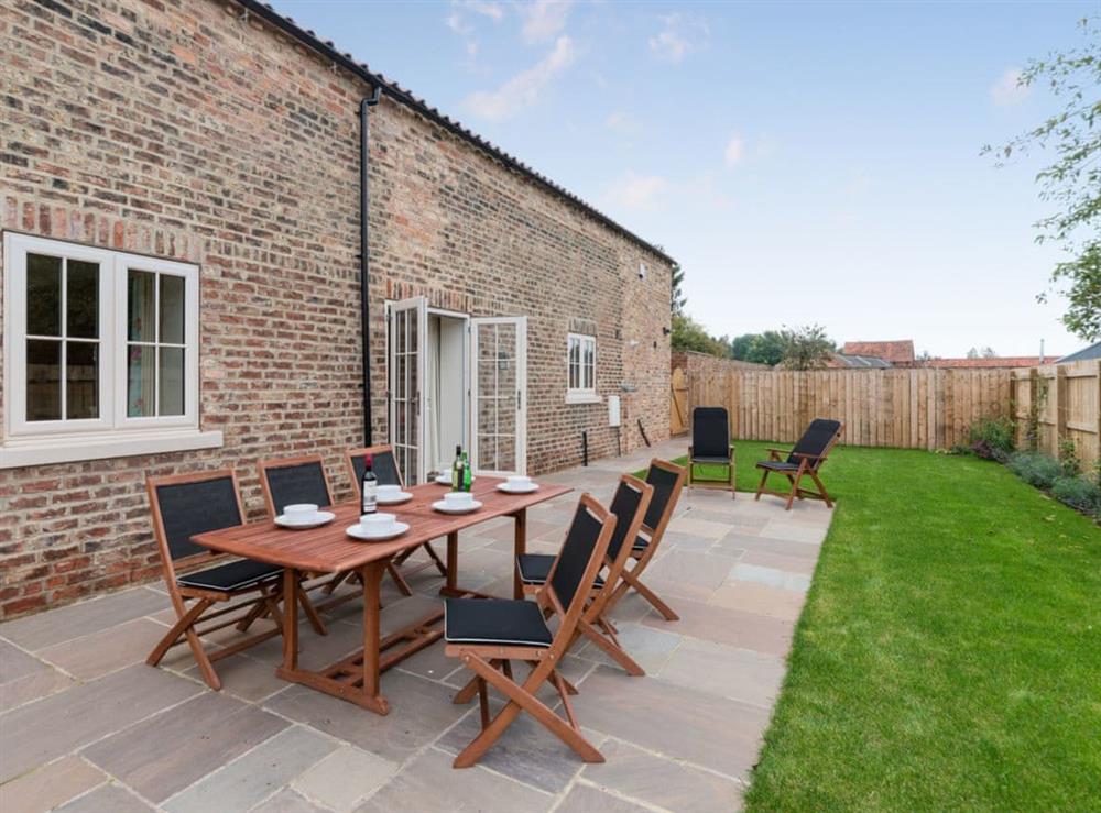 Outdoor dining area at White Lodge Cottage in Carlton Miniott, near Thirsk, North Yorkshire