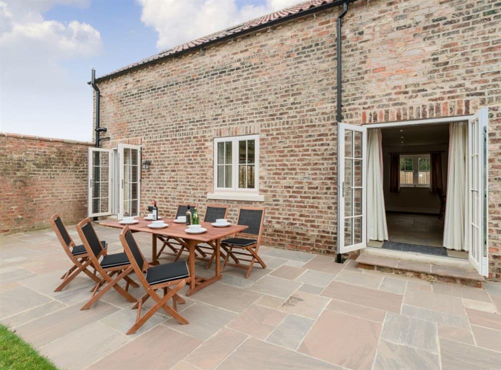 Outside dining area at White Lodge Cottage in Carlton Miniott, near Thirsk, North Yorkshire