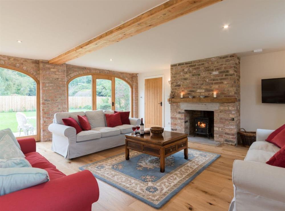Spacious and comfortable living room at White Lodge Cottage in Carlton Miniott, near Thirsk, North Yorkshire