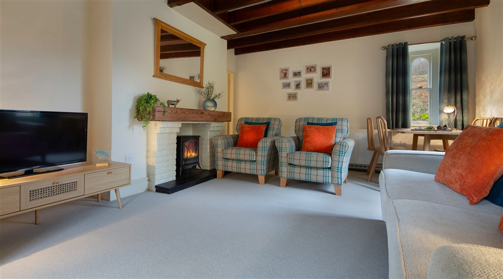 The sitting and dining room at White Lodge in Ganllwyd, Gwynedd