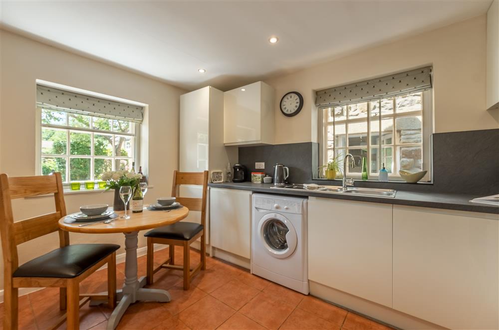 Contemporary kitchen and dining area at White Rose Cottage, Constable Burton, Leyburn